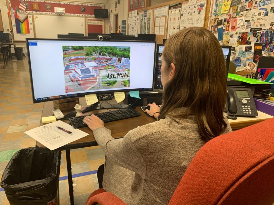 Mrs. Burgin works on the cover of the 2020-2021 yearbook, titled Dont Blink