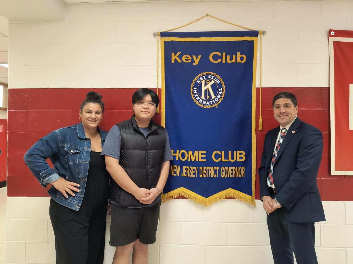 Justin Chen poses with Key Club Advisor, Ms. Maloupis & Principal Dr. Toriello